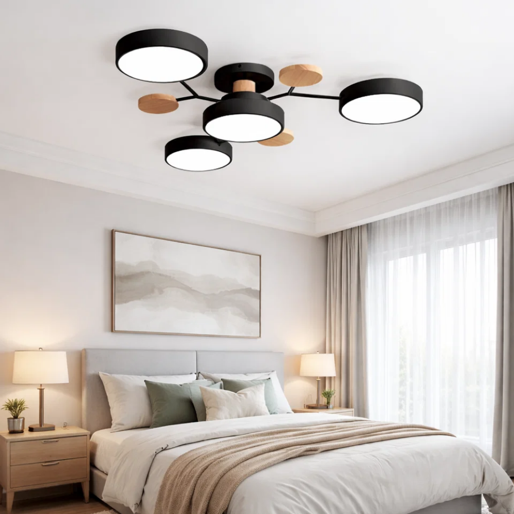 Lampa sufitowa LED w kolorze czarnym z 4 punktami świetlnymi nad łóżkiem w sypialni