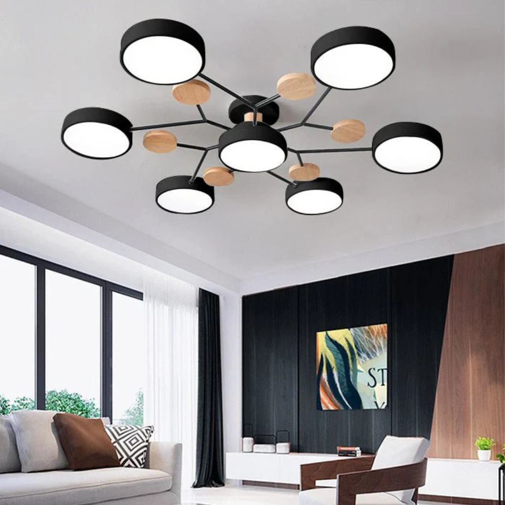 Czarna lampa sufitowa LED z 7 punktami świetlnymi o średnicy 111 cm w dużym salonie