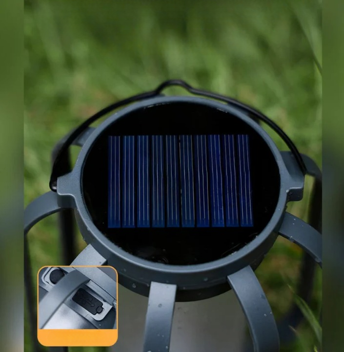 Inna lampa solarna z szarą obudową i nóżkami, zbliżenie panelu słonecznego