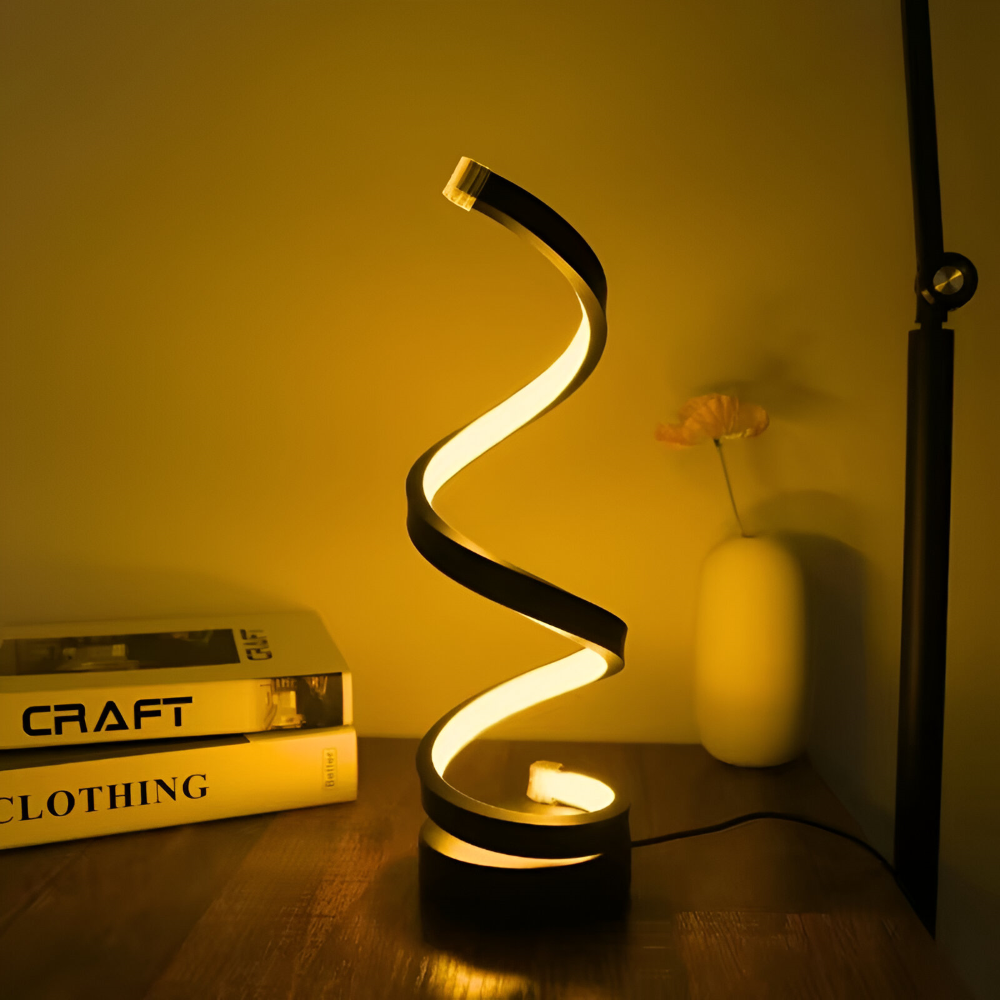 Spiralna lampka nocna LED na biurku