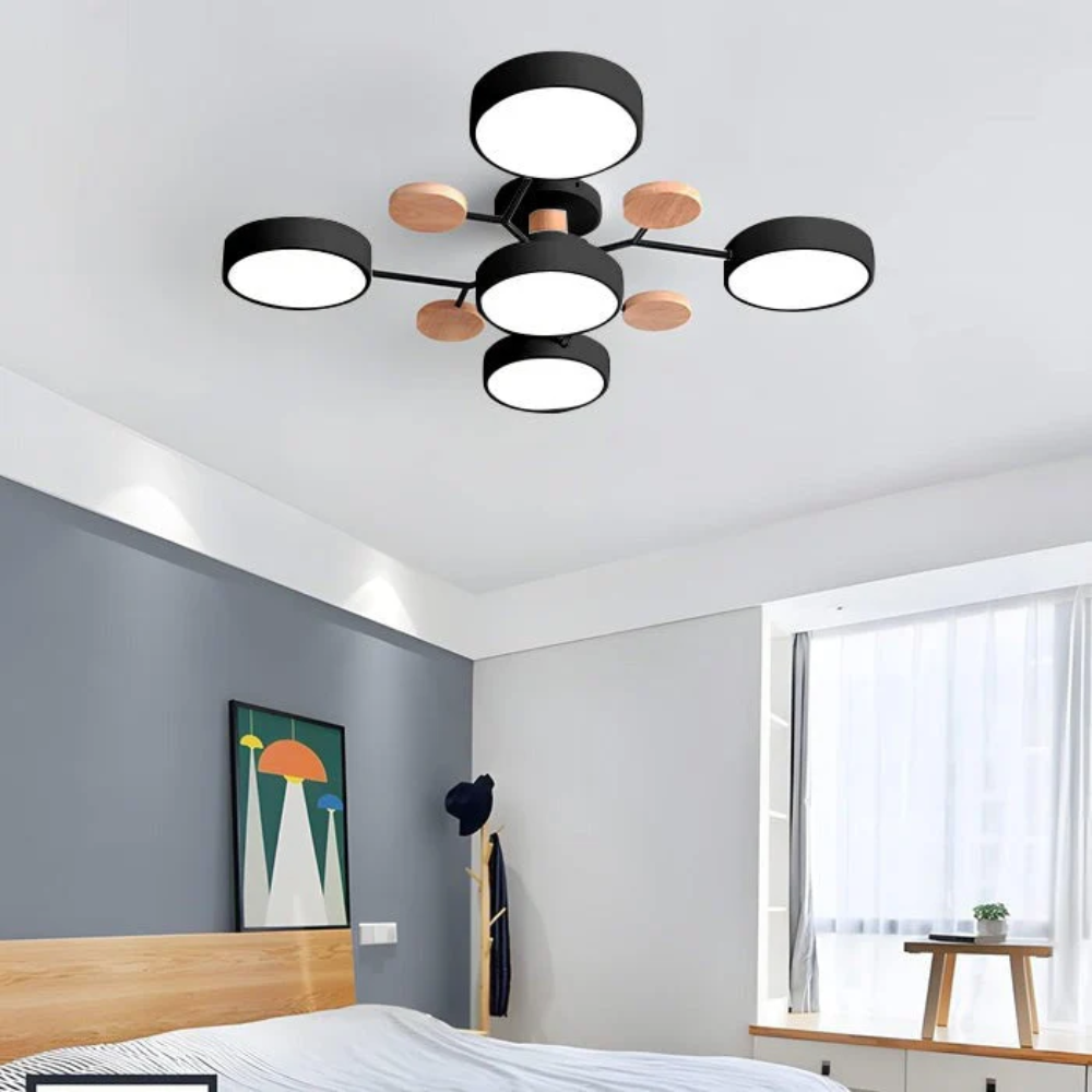 Czarna lampa sufitowa LED z 5 punktami świetlnymi w nowoczesnym salonie