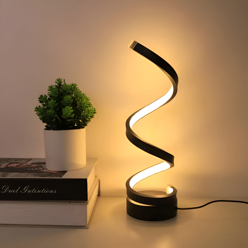 Lampka spirala z rośliną w tle